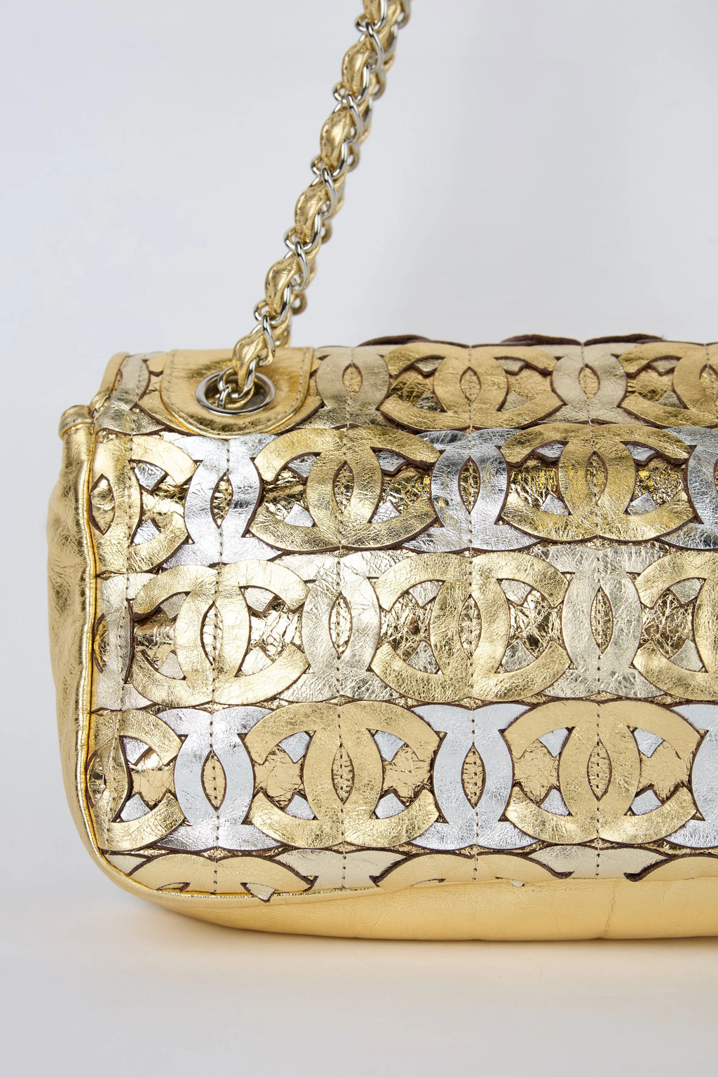 CHANEL CC CUTOUT GOLD METALLIC FLAP