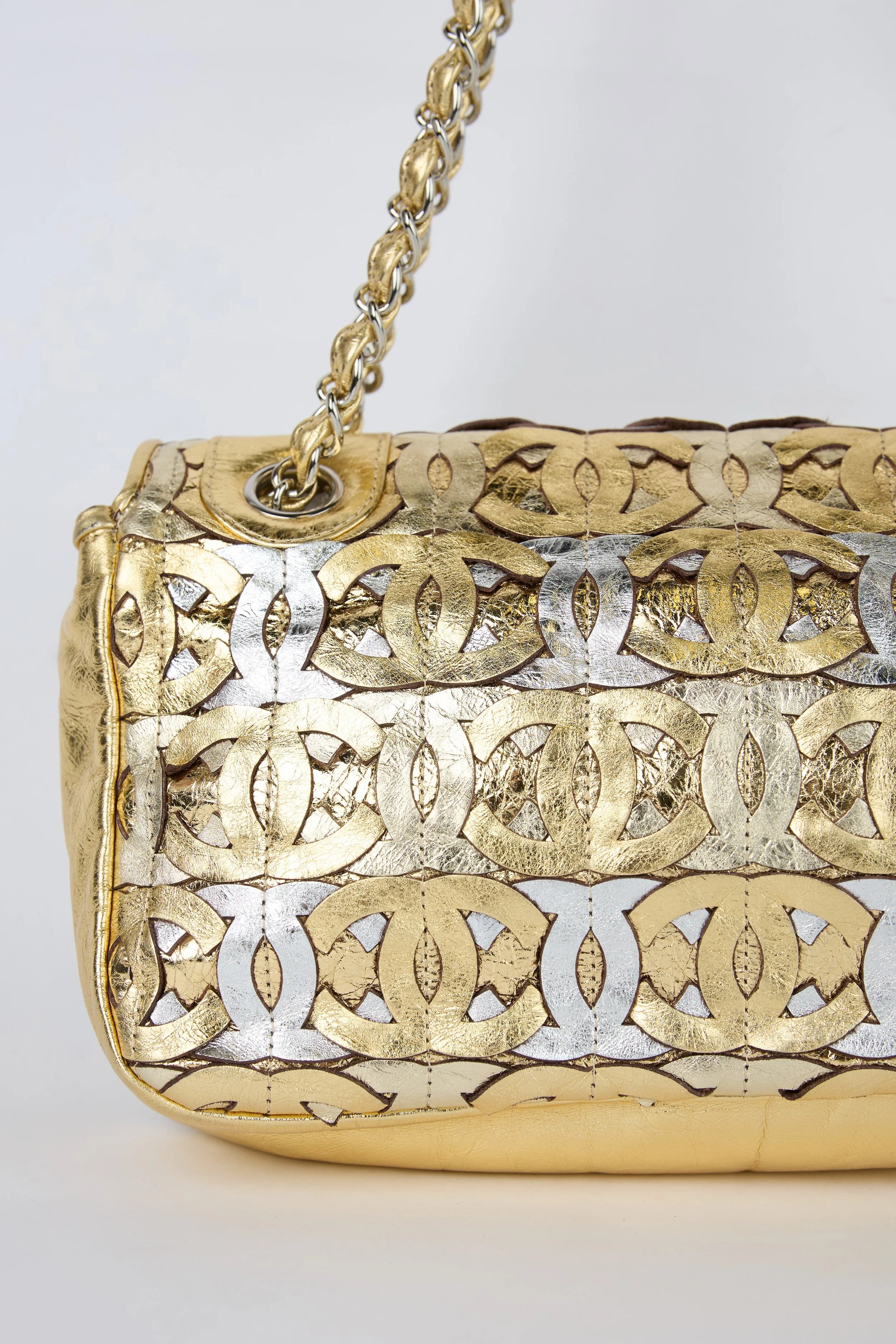 CHANEL CC CUTOUT GOLD METALLIC FLAP