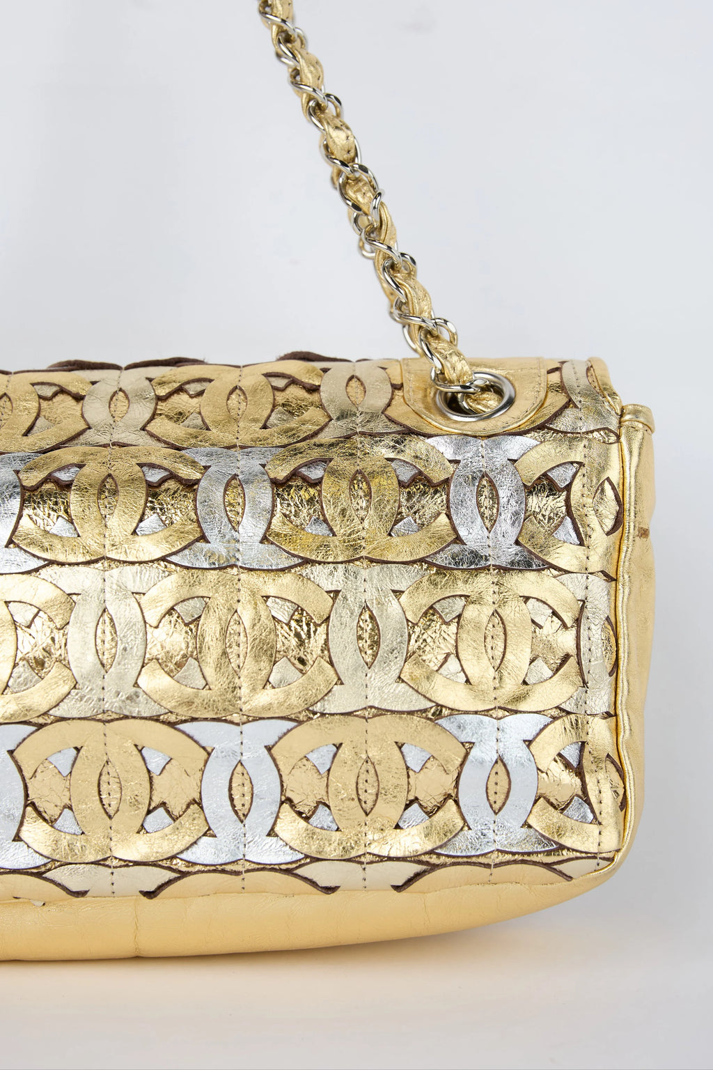 CHANEL CC CUTOUT GOLD METALLIC FLAP