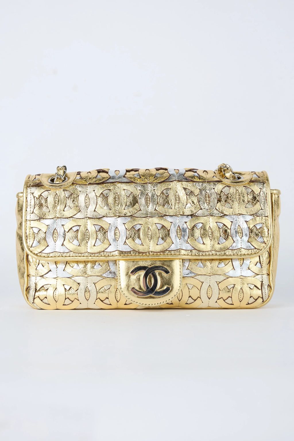 CHANEL CC CUTOUT GOLD METALLIC FLAP
