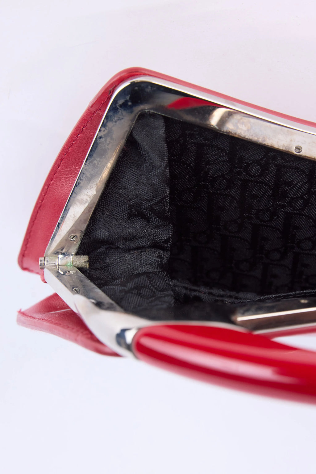 RARE DIOR RED BONDAGE CLUTCH