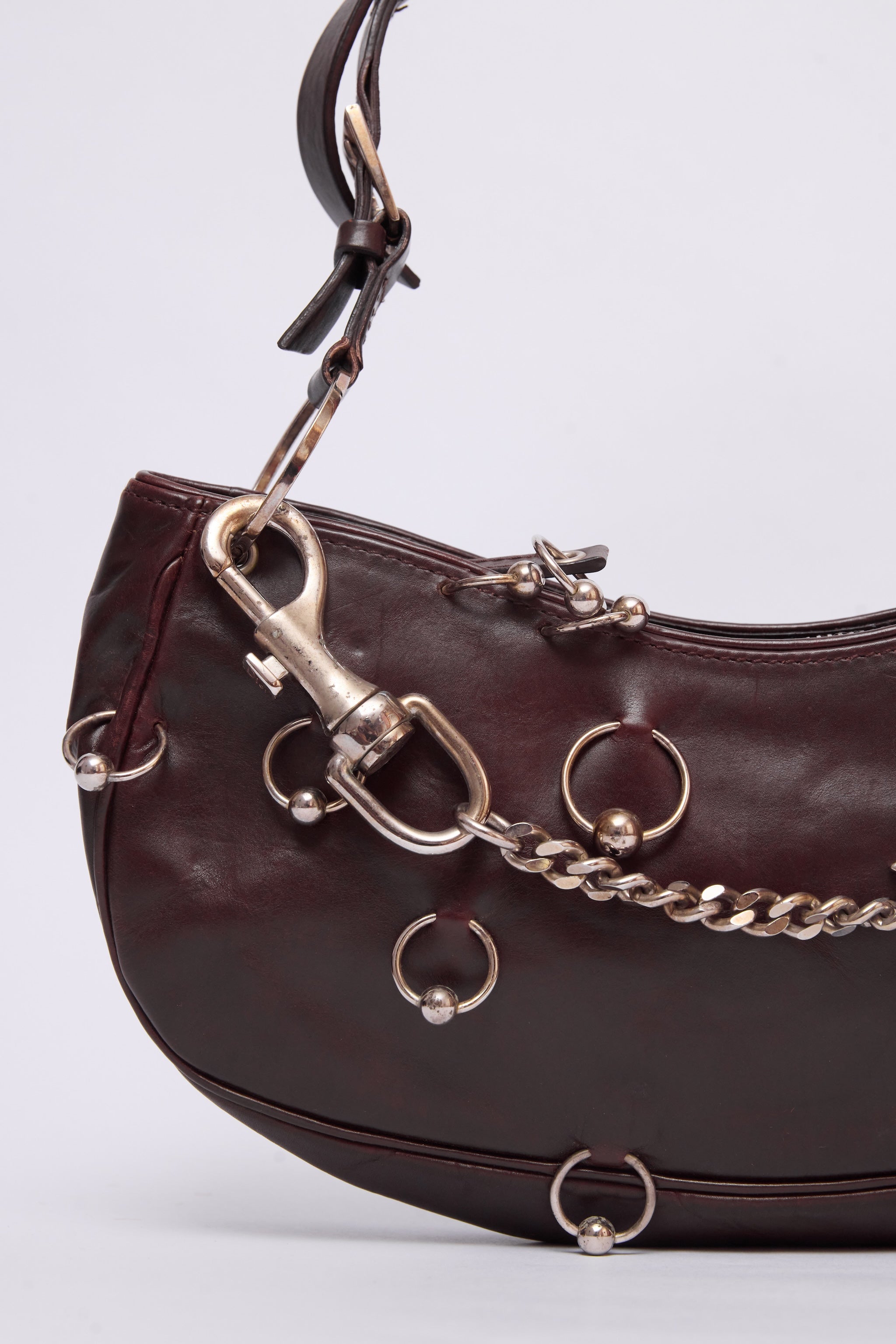 DIOR BROWN HARDCORE PIERCED POCHETTE