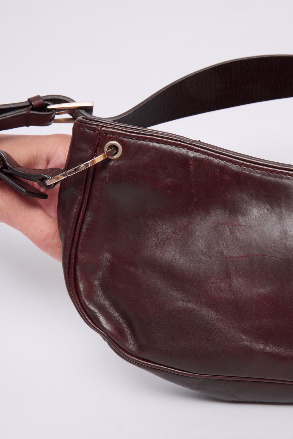 DIOR BROWN HARDCORE PIERCED POCHETTE