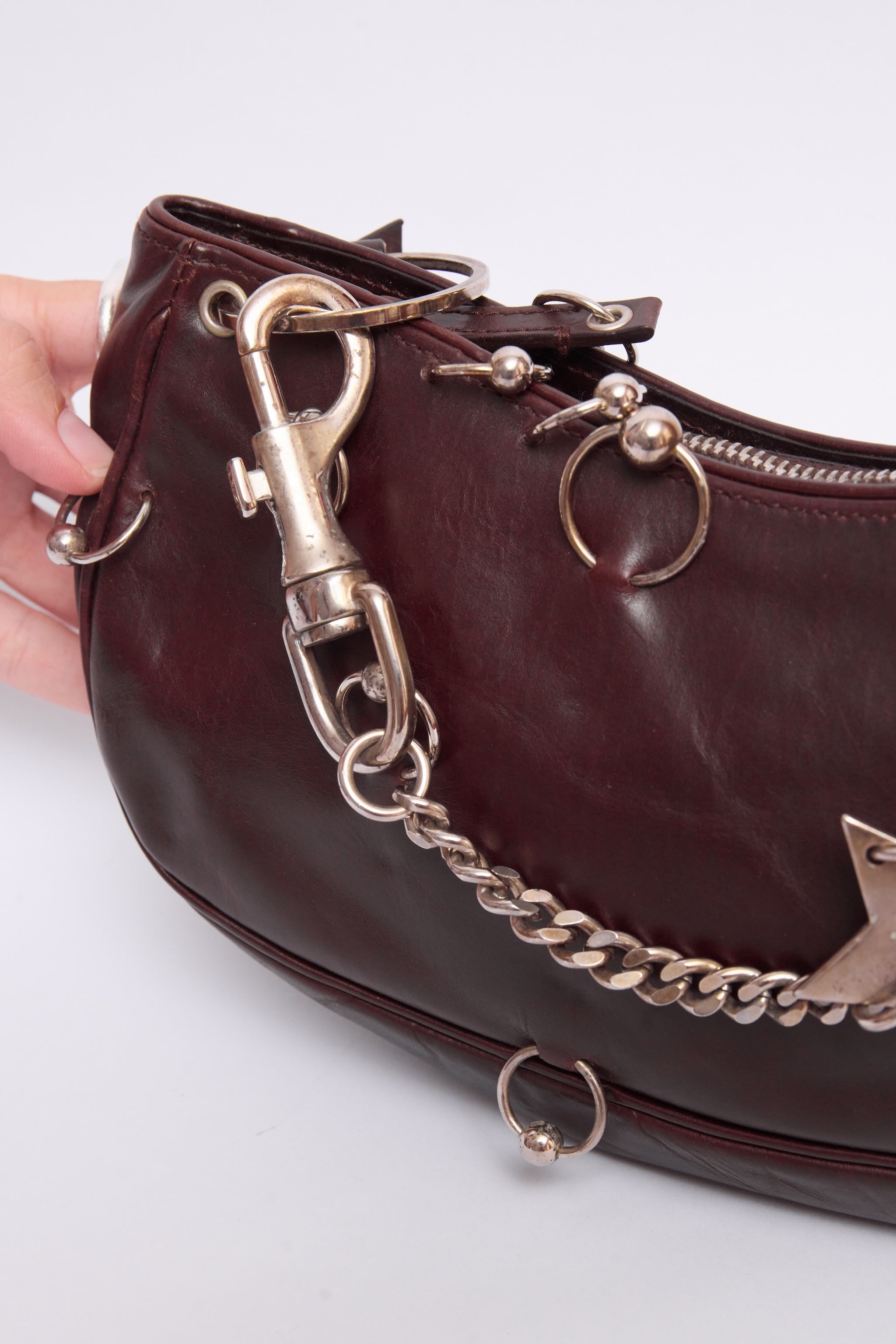 DIOR BROWN HARDCORE PIERCED POCHETTE