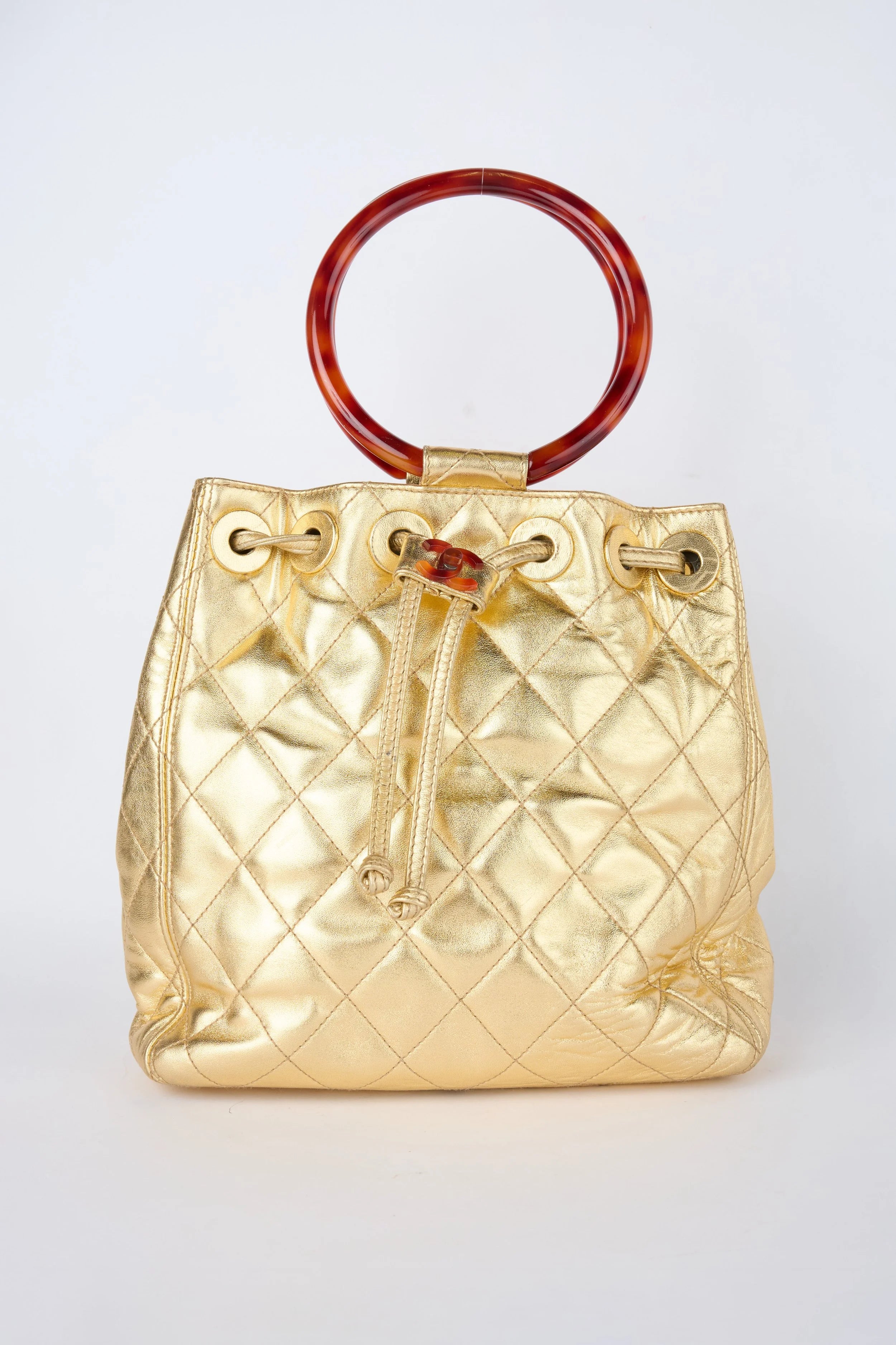 CHANEL CHAMPAGNE GOLD HOBO BUCKET