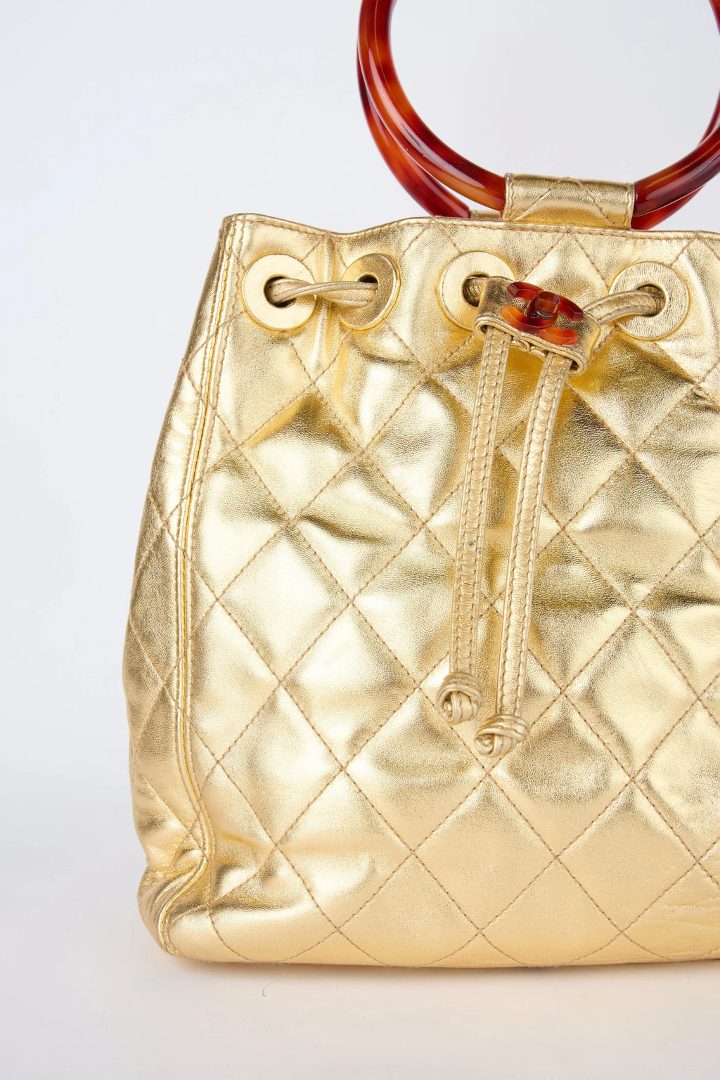 CHANEL CHAMPAGNE GOLD HOBO BUCKET