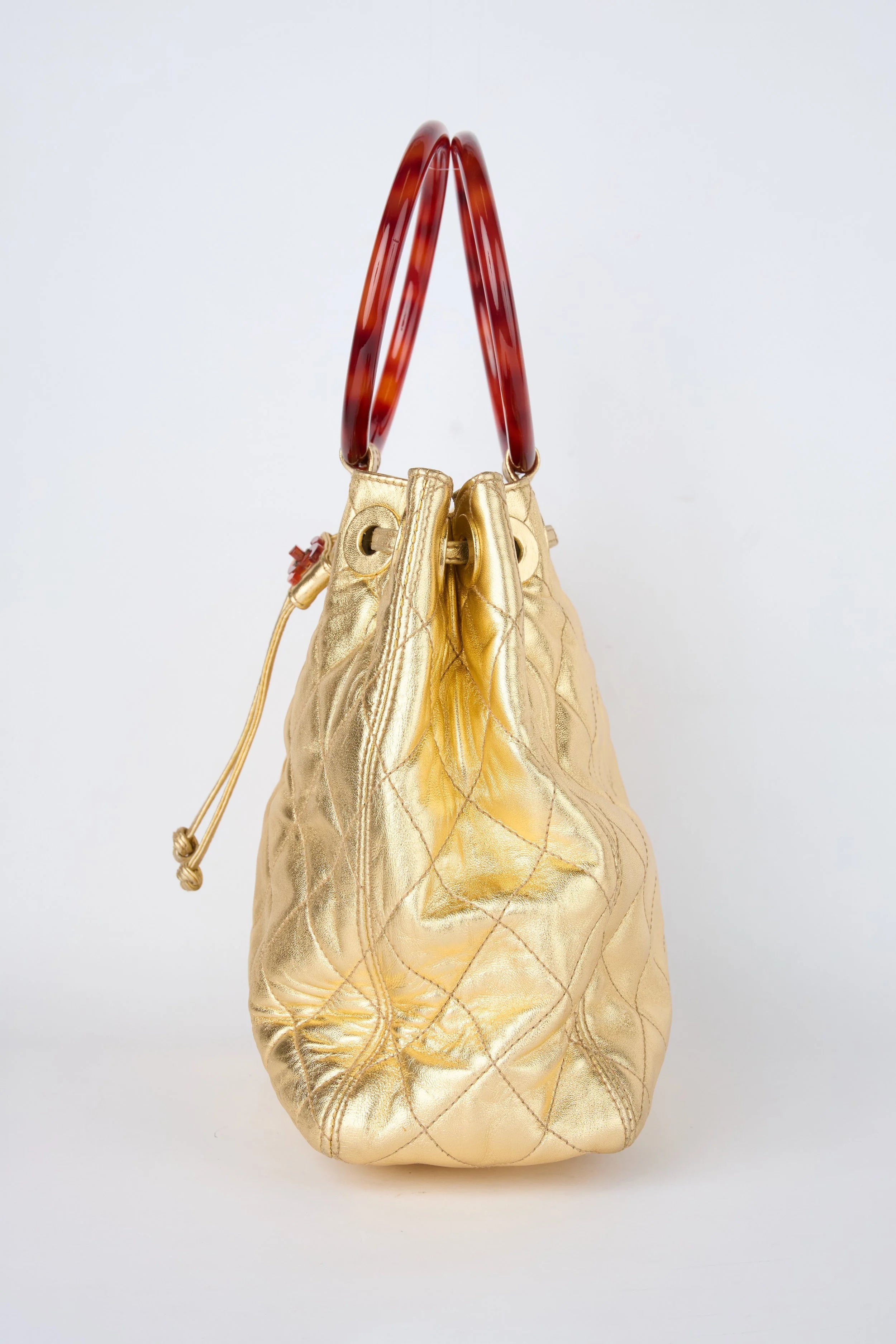 CHANEL CHAMPAGNE GOLD HOBO BUCKET