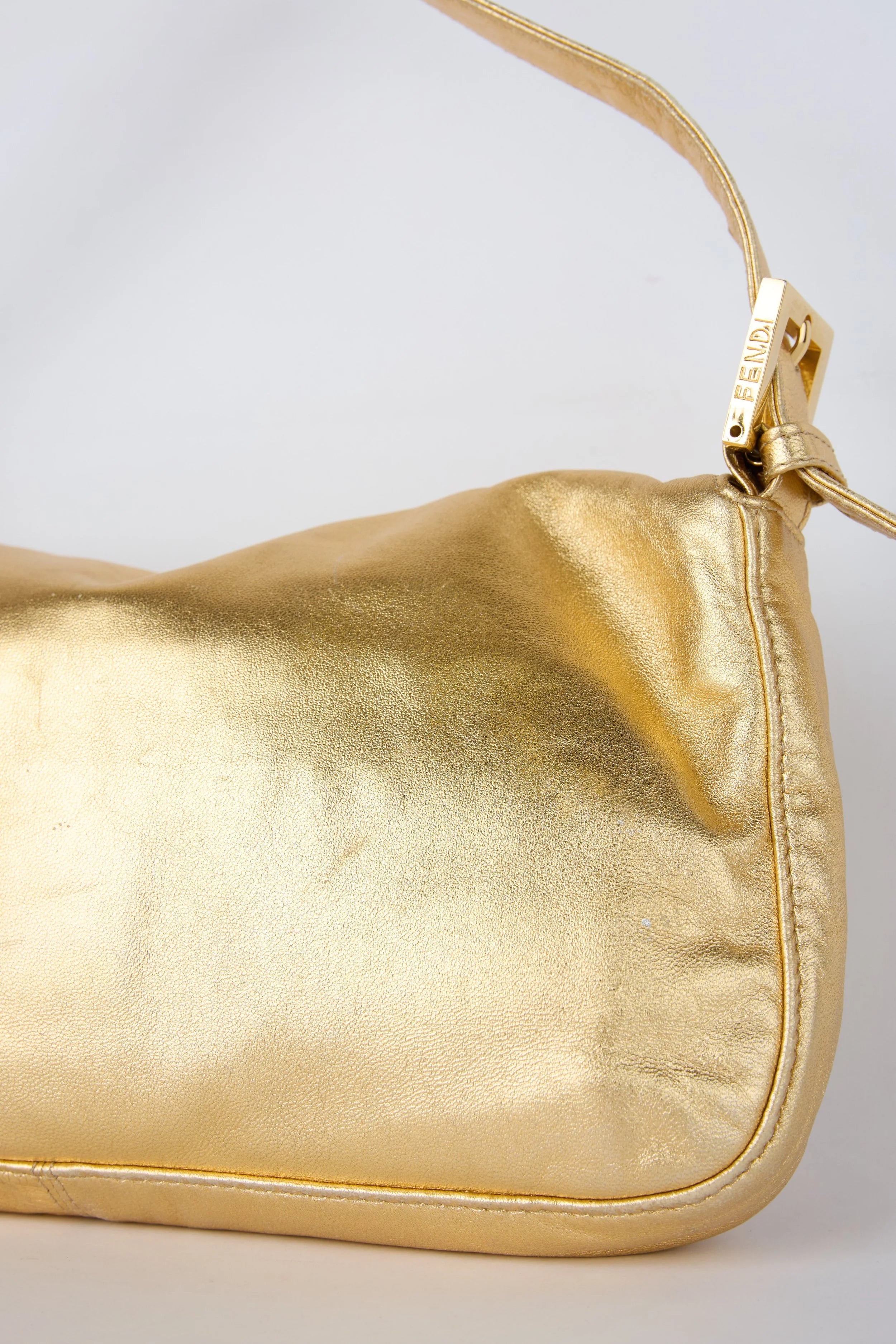FENDI GOLD METALLIC BAGUETTE