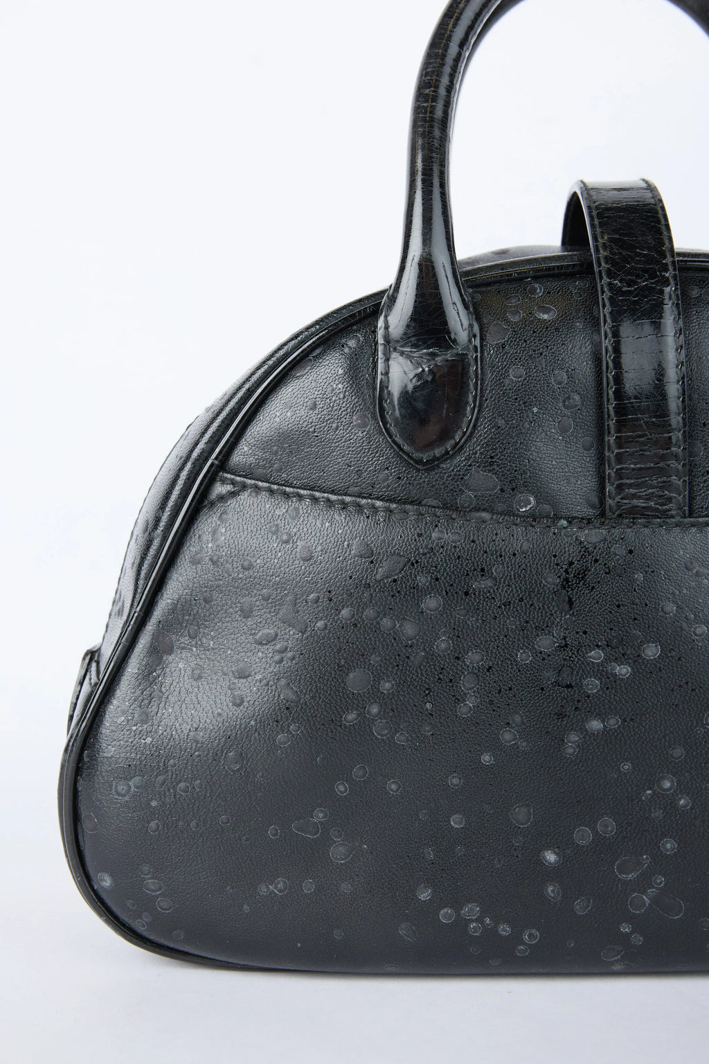 DIOR SPLATTERED BLACK DOUBLE SADDLE BOWLER
