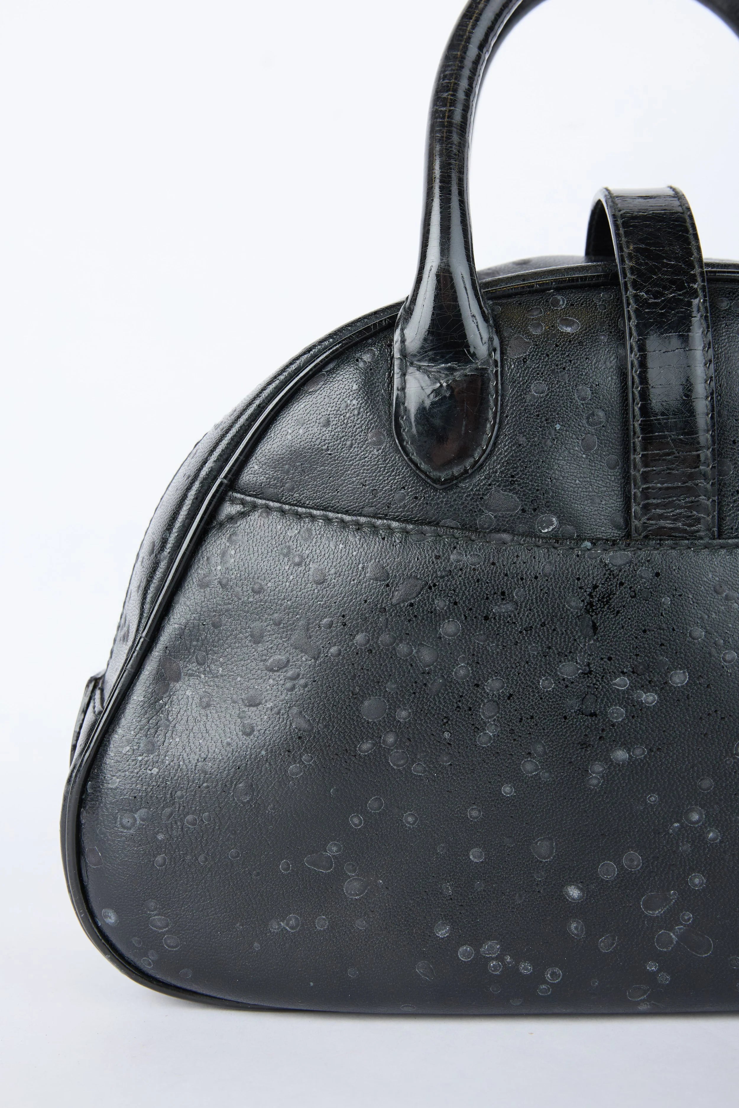 DIOR SPLATTERED BLACK DOUBLE SADDLE BOWLER