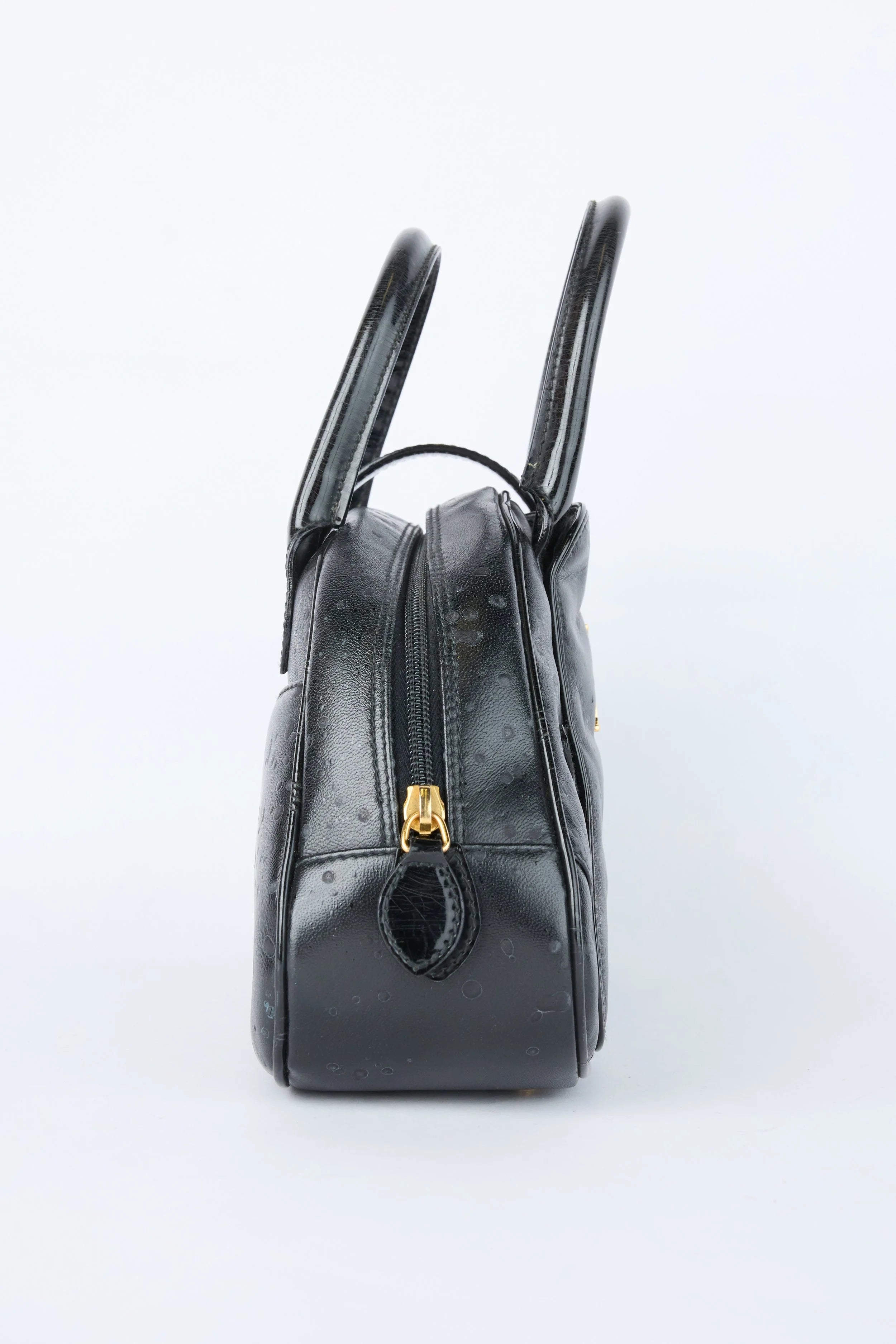 DIOR SPLATTERED BLACK DOUBLE SADDLE BOWLER