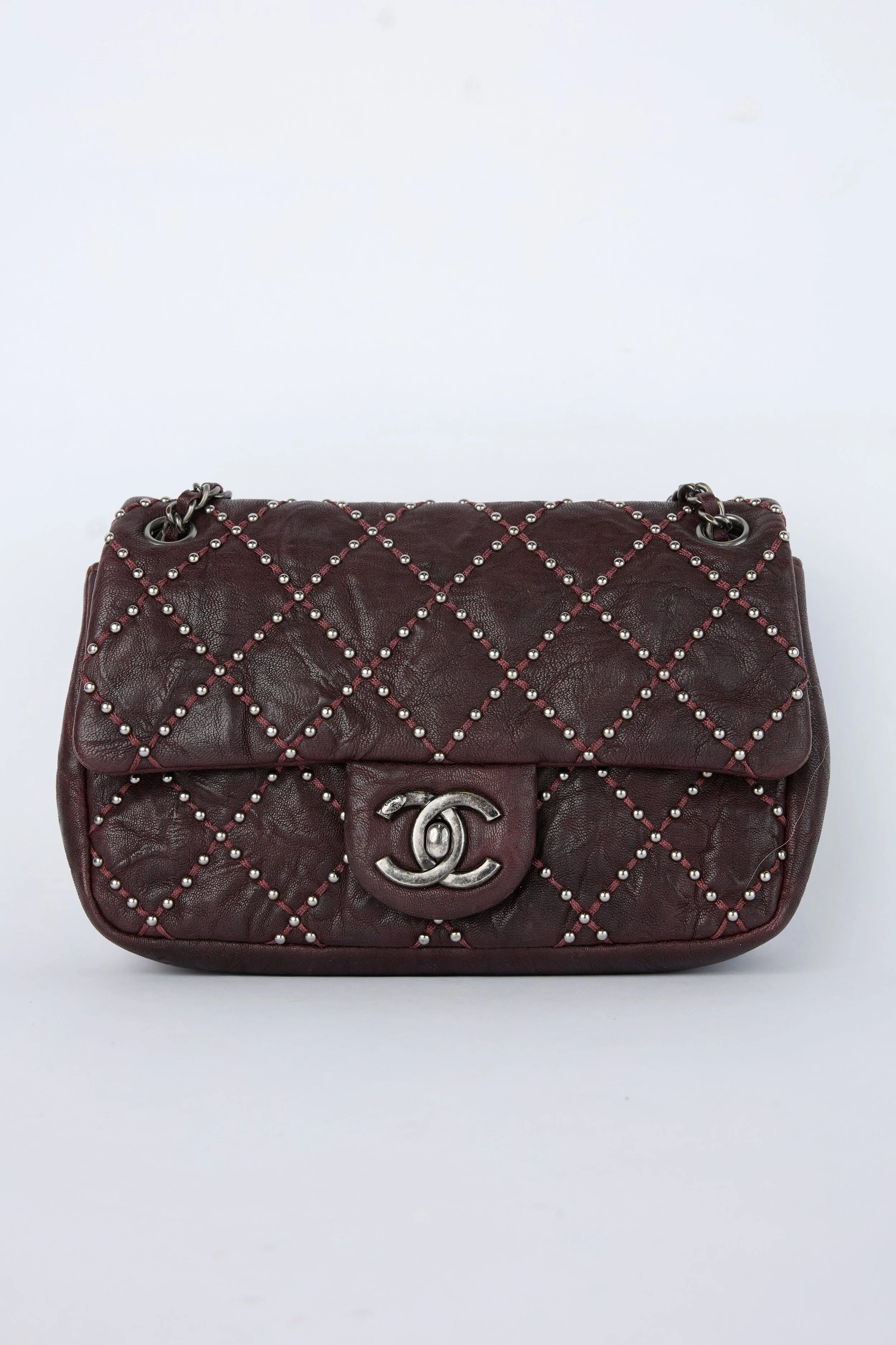 CHANEL BURGUNDY STUDDED FLAP